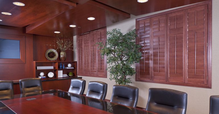 Shutters are one option for covering a conference room’s windows